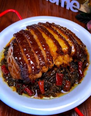 梅菜扣肉的历史典故,梅菜扣肉的历史典故是什么